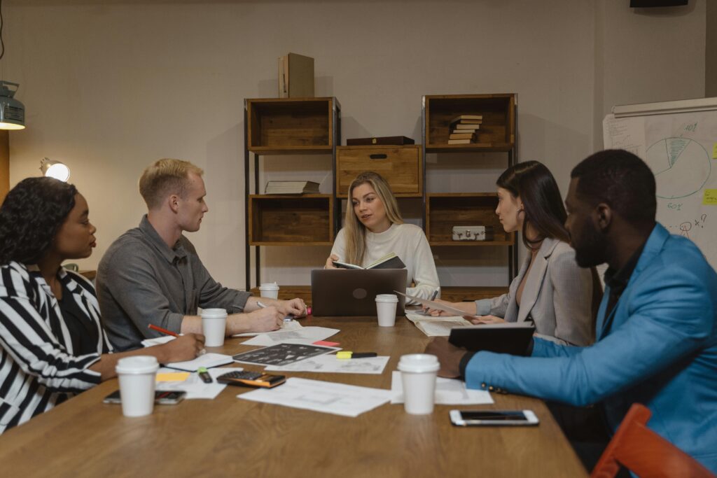 People in the middle of a meeting.