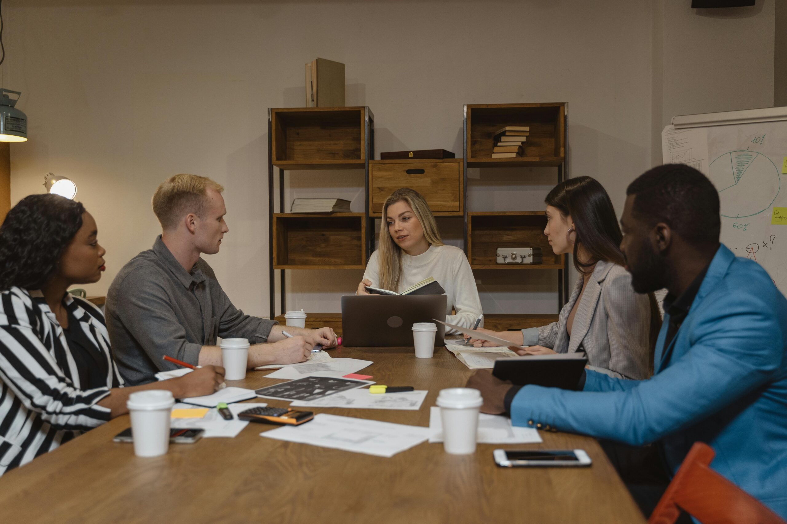 People in the middle of a meeting.